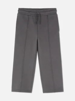 Calças Treino Cordão Corte Perna Larga