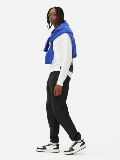 Calças Treino Elásticas Corte Folgado