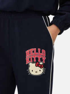 Calças Treino Perna Direita Riscas Hello Kitty