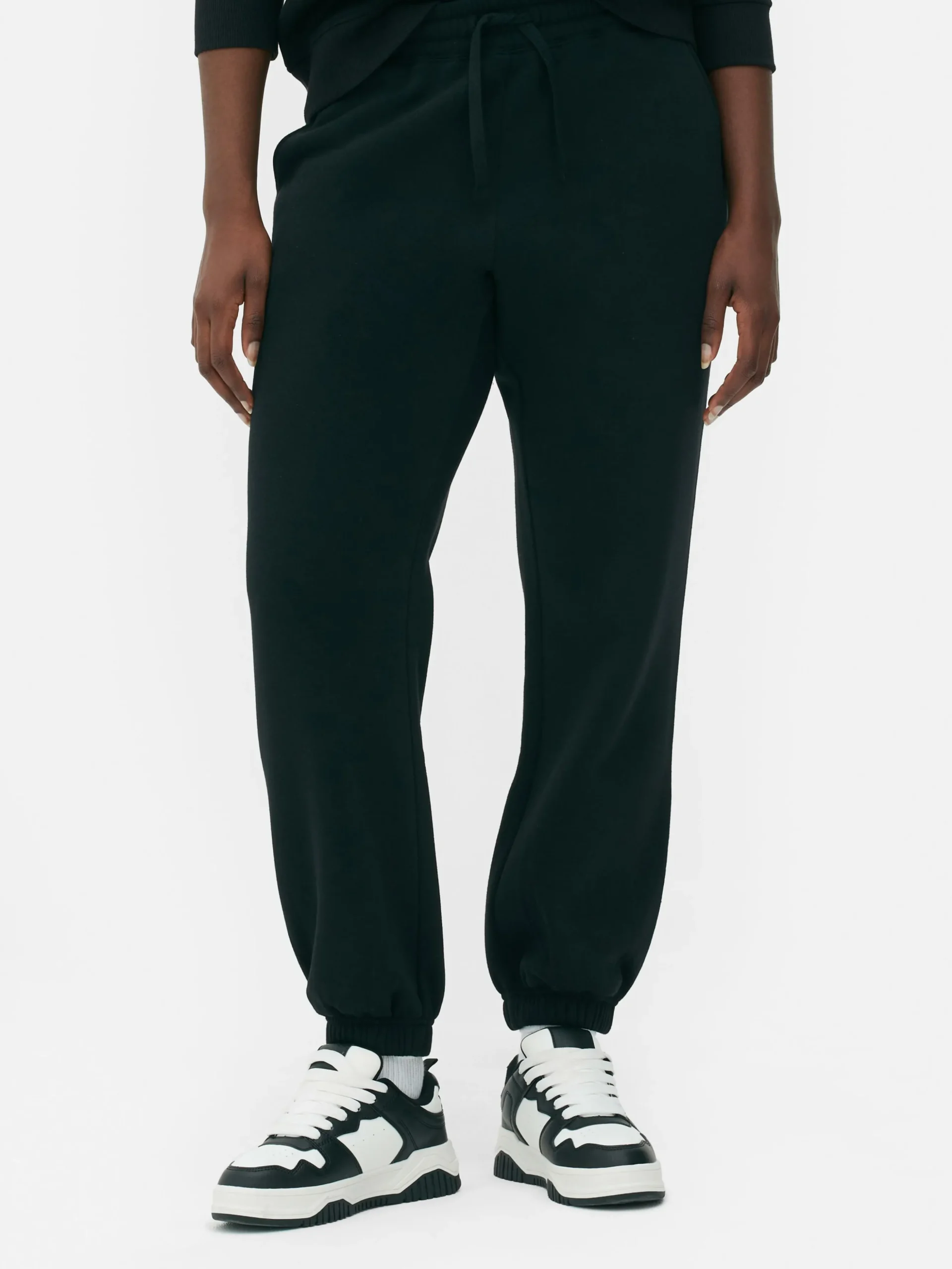 Calças Treino Punho Cordão