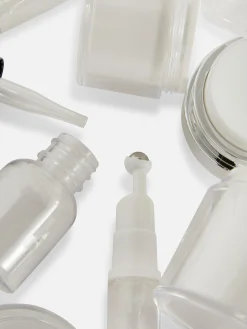 Conjunto 4 Recipientes Cuidados Pele Viagem