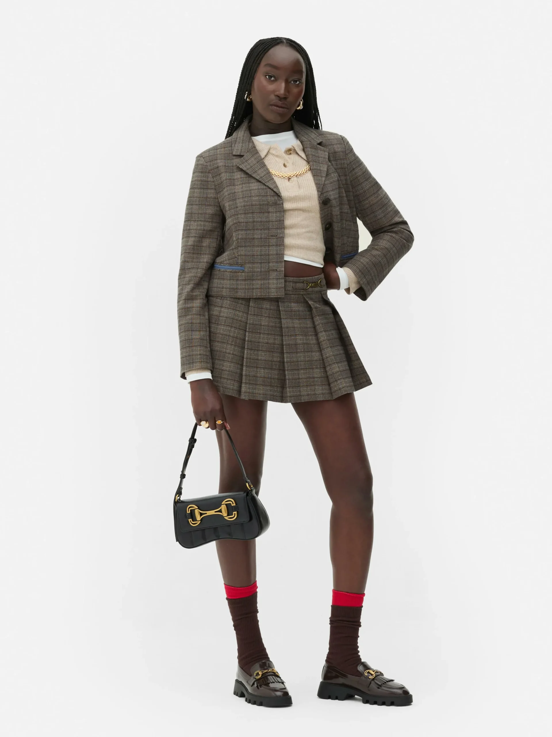 Saia-calção Mini Xadrez Detalhe Fivela Rita Ora